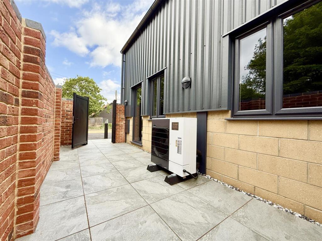 courtyard garden with air source heat pump