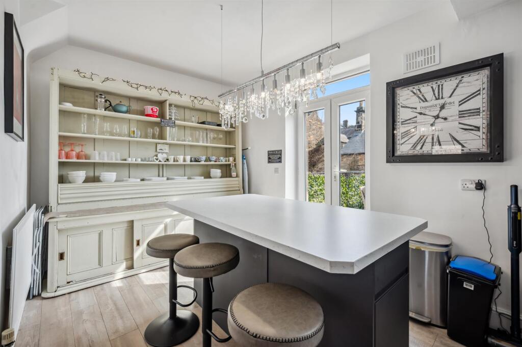 Kitchen - island and doors to balcony terrace.jpg
