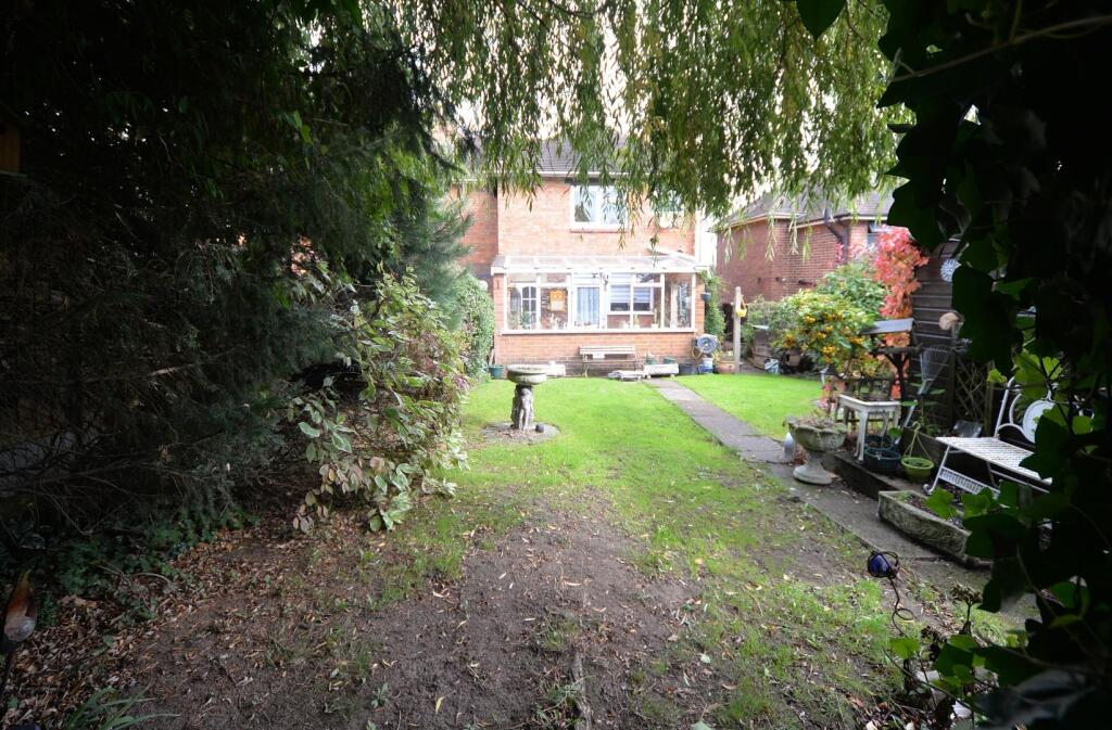 view of house from pergola.JPG