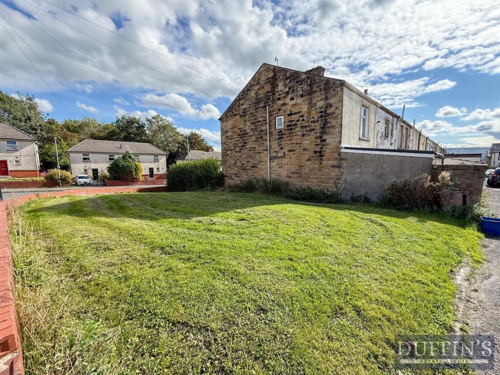 Plot of Land to the side of the property