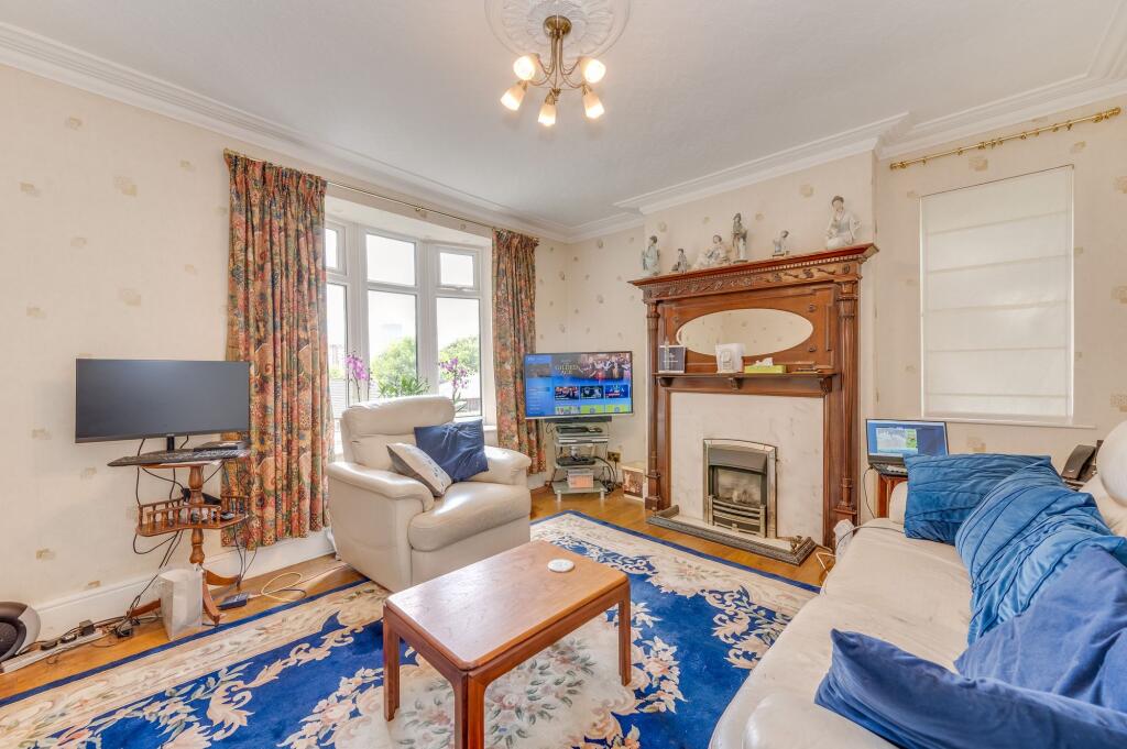 KITCHEN, UTILITY ROOM, DINER AND LIVING ROOM
