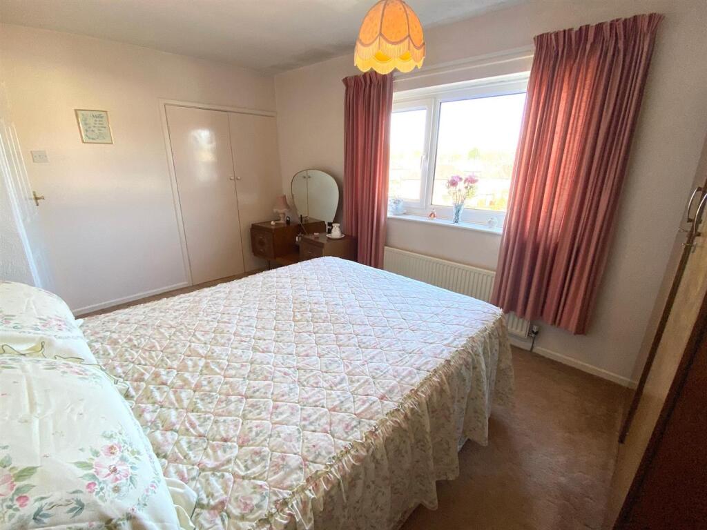 bed 1 other angle showing built in wardrobe.jpg