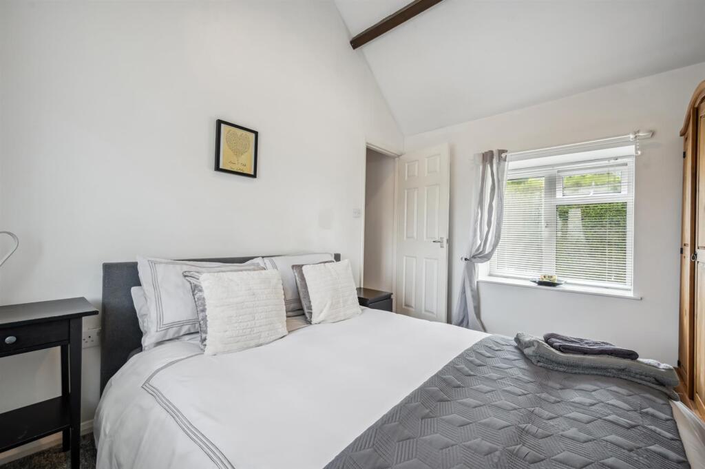 Bedroom Four to front window.jpg