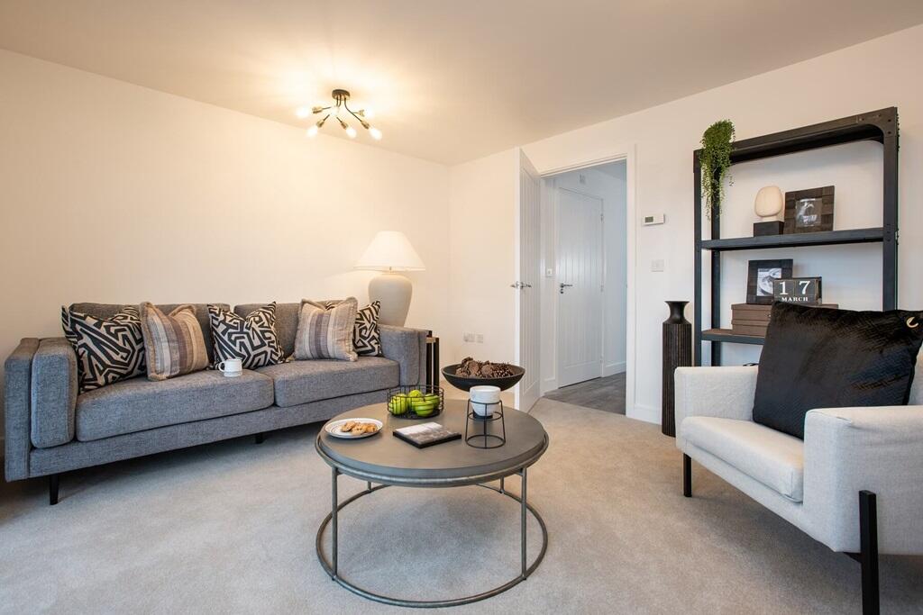 The living/dining area features double doors out to the garden