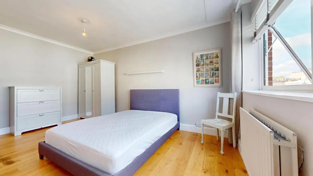 Bright and airy double bedroom featuring clean ...