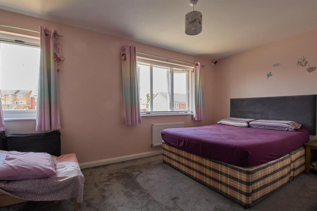 FRONT BEDROOM ONE