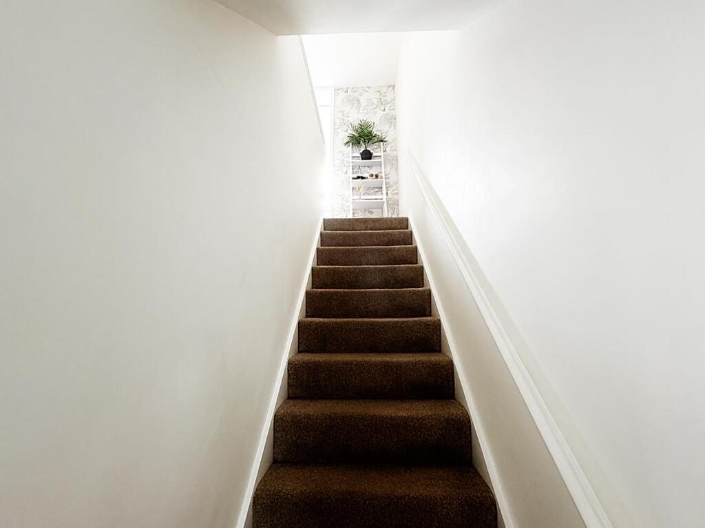 Stairs to first floor and landing