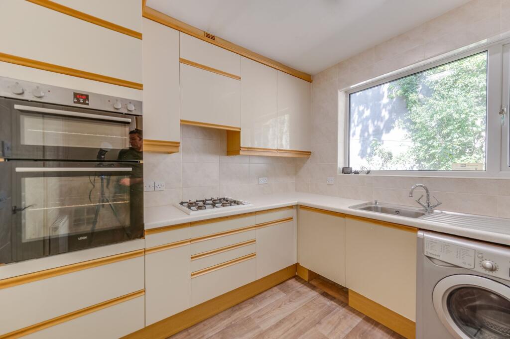 SITTING ROOM AND KITCHEN