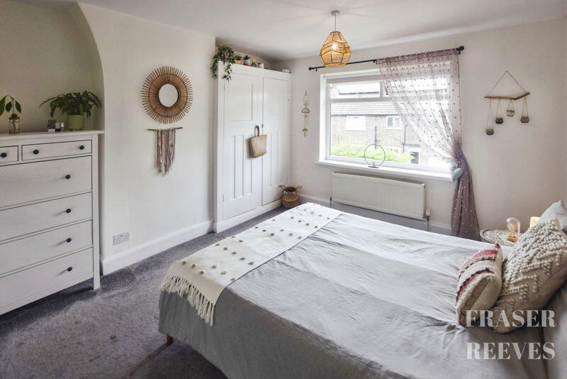 BEDROOM ONE AT THE REAR