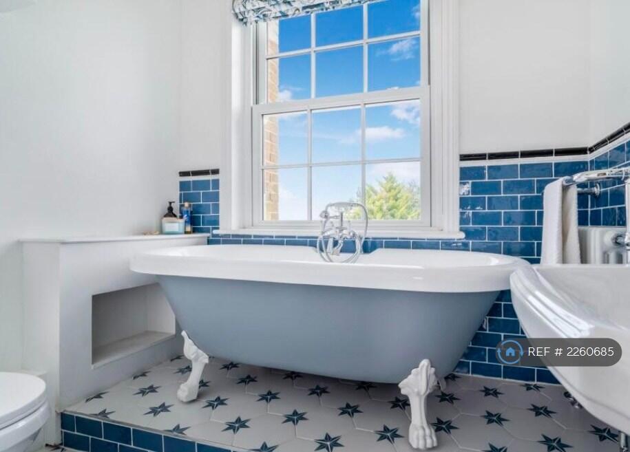 Family Bathroom With Roll Top Bath + Views