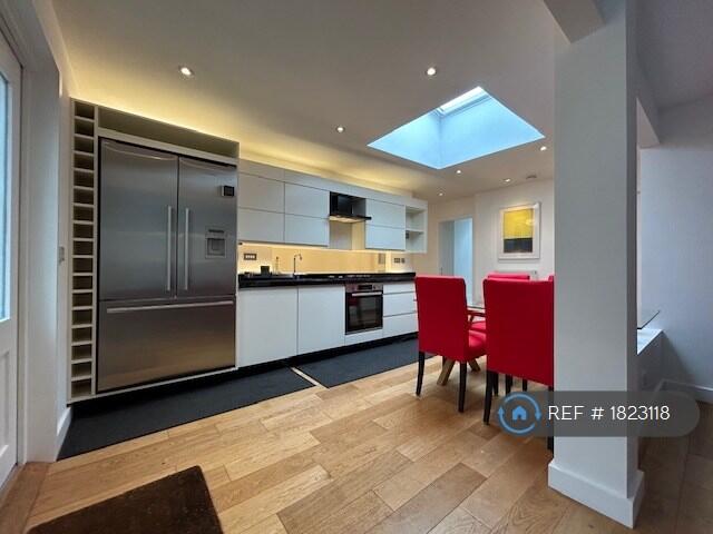 Kitchen With American Fridge With Ice And Water