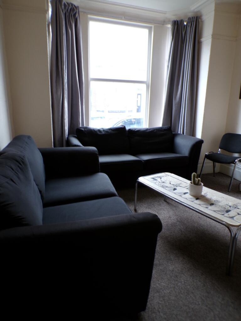 A cozy living room featuring comfortable seatin...