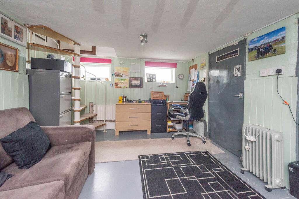 CONVERTED LOWER GROUND FLOOR AND STORE ROOM