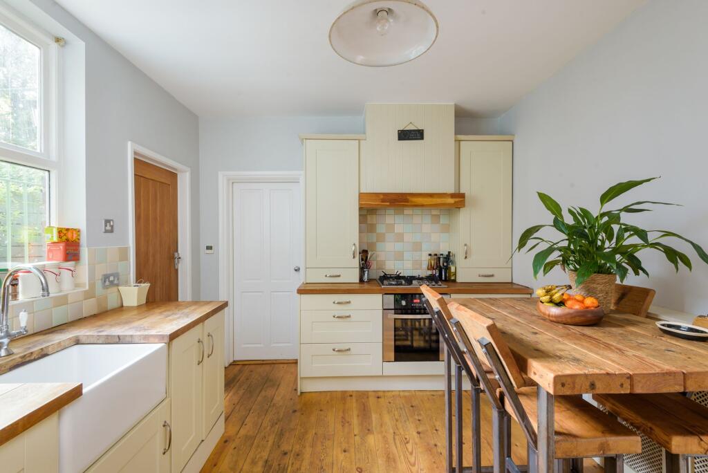 SITTING ROOM AND DINING KITCHEN