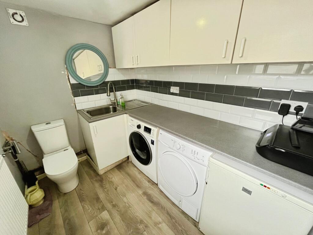 Utility Room/ W/C