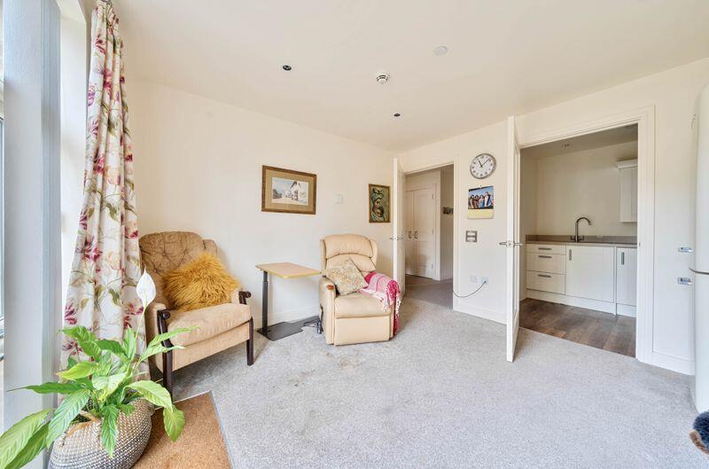 Living/dining room through to kitchen