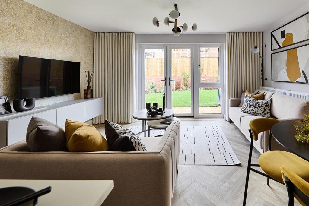 The living/dining area features French doors to the rear garden