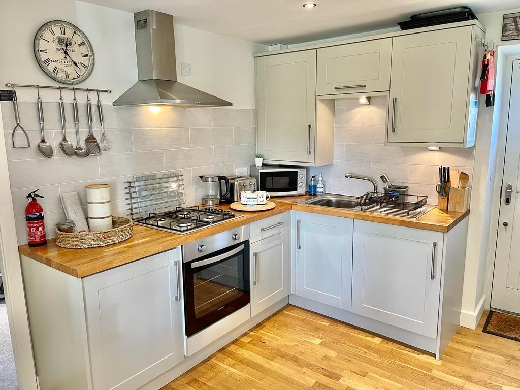 OPEN PLAN LIVING, DINING AND KITCHEN AREAS
