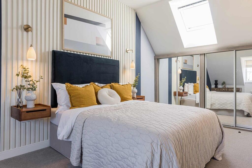 Enjoy privacy in the main bedroom on the second floor