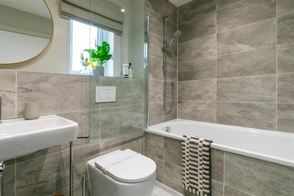 Luxury Bathroom with Shower over Bath