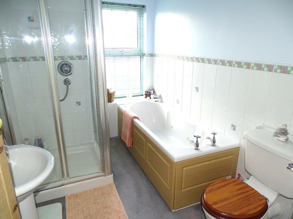 GOOD SIZE FOUR PIECE BATHROOM