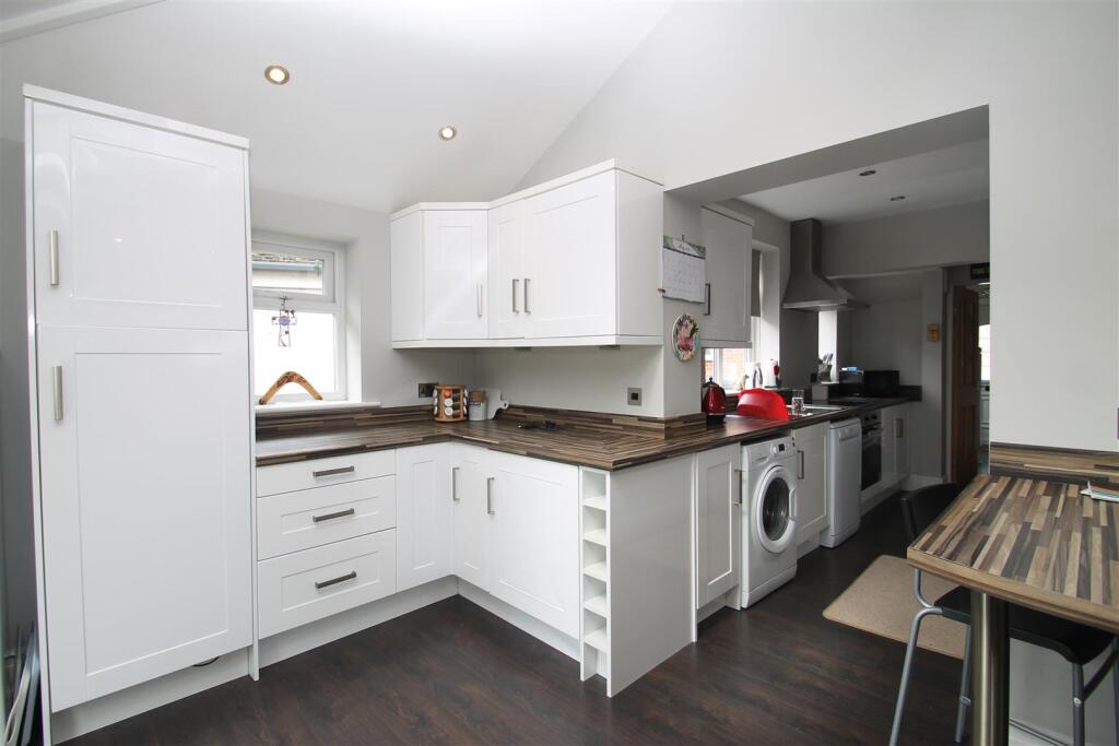 family to kitchen.JPG