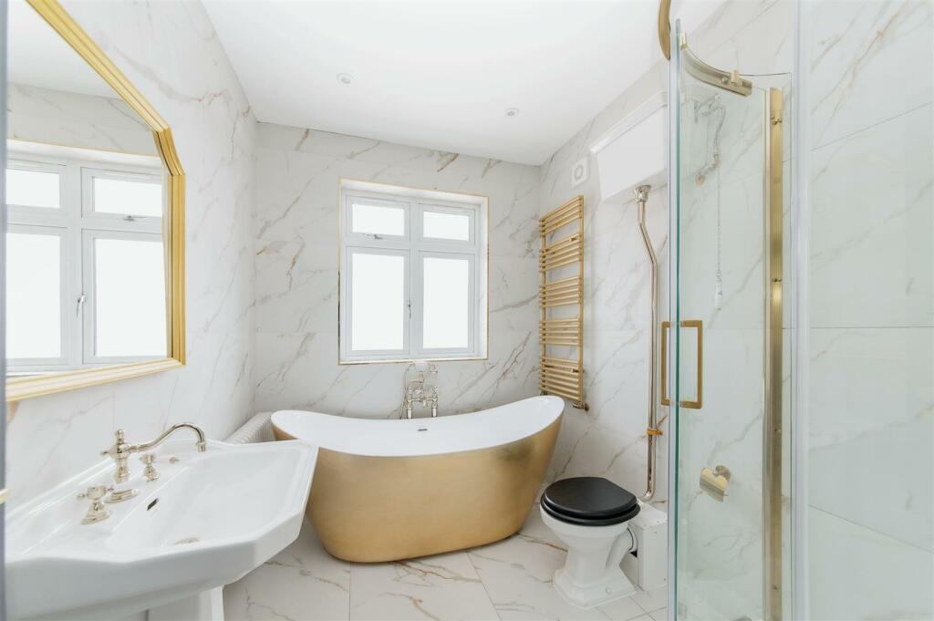 GOLD BATHROOM.jpg