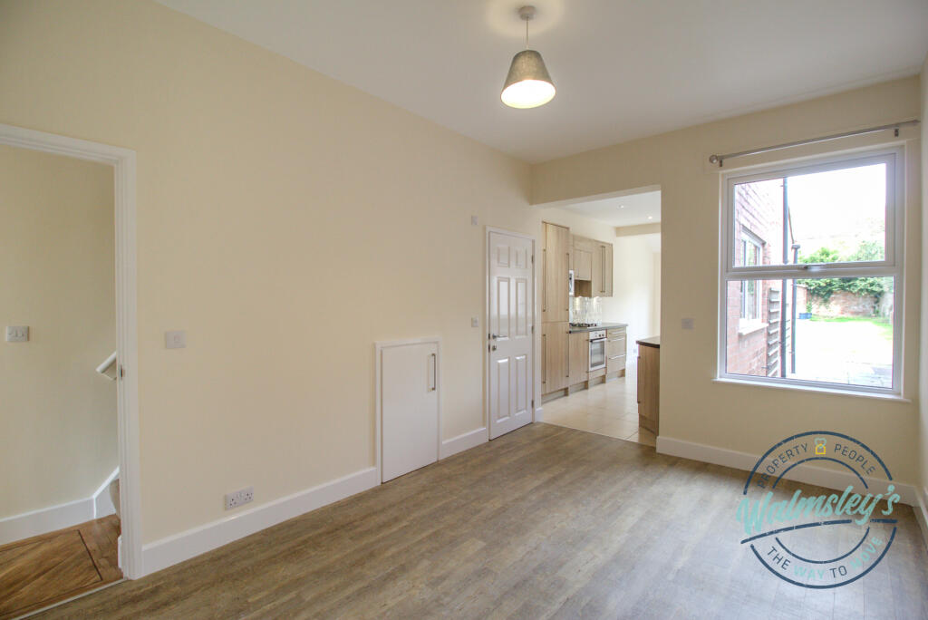Rear reception with cloakroom understairs