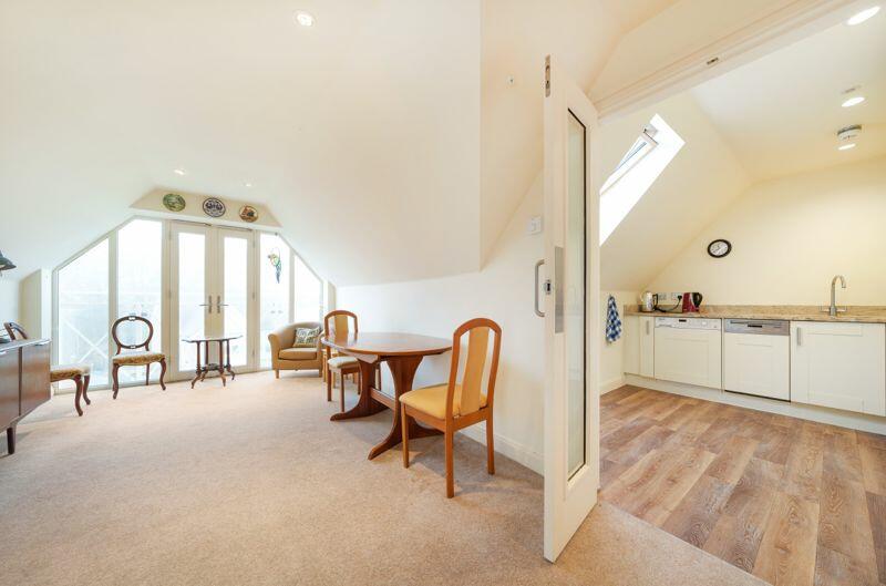 Living/dining room through to kitchen