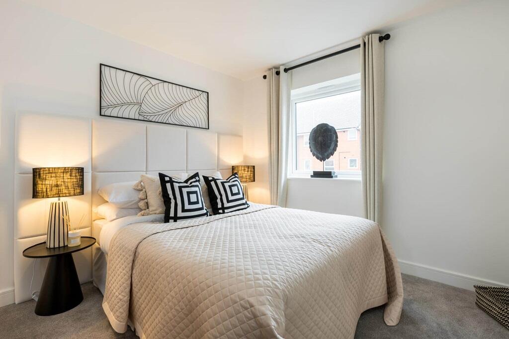 A spacious bedroom gives you space to unwind and relax