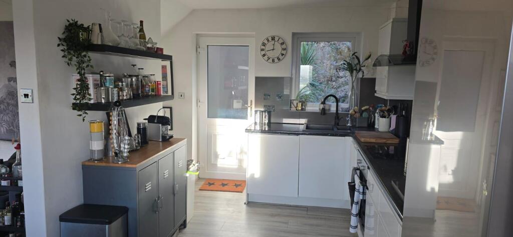 Kitchen door to rear and to downstairs