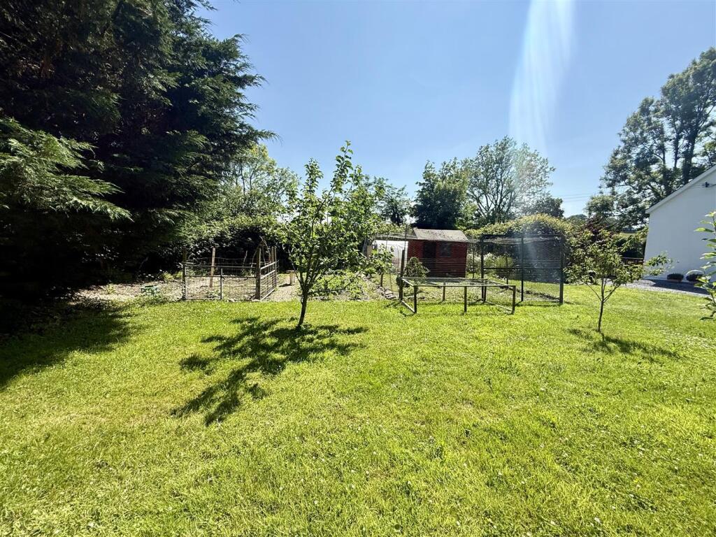 Enclosed poultry run and vegetable garden