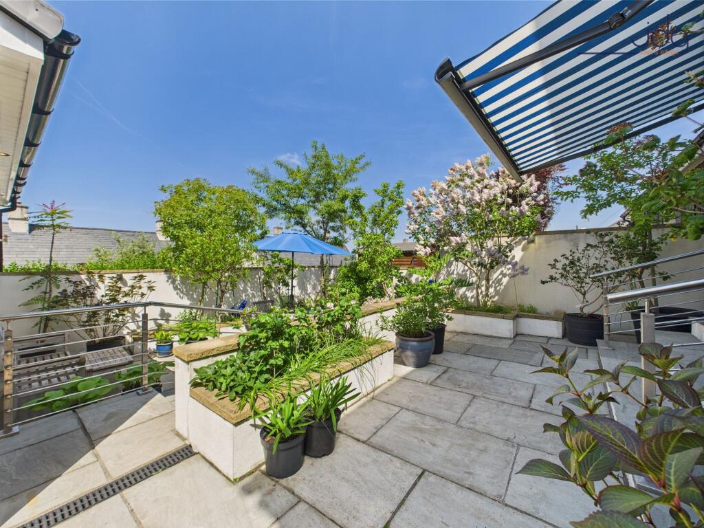 Sliding Patio Doors, Flagged Patio and Seating area