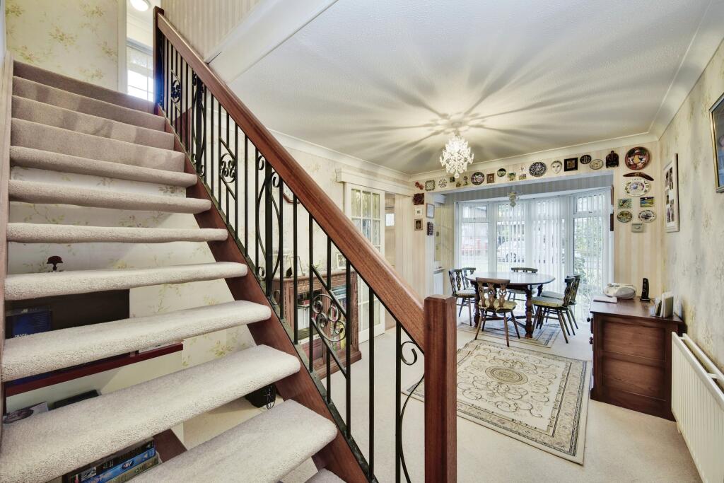 Dining Room With Staircase