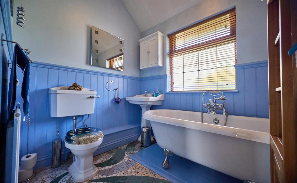 Family Bathroom to rear