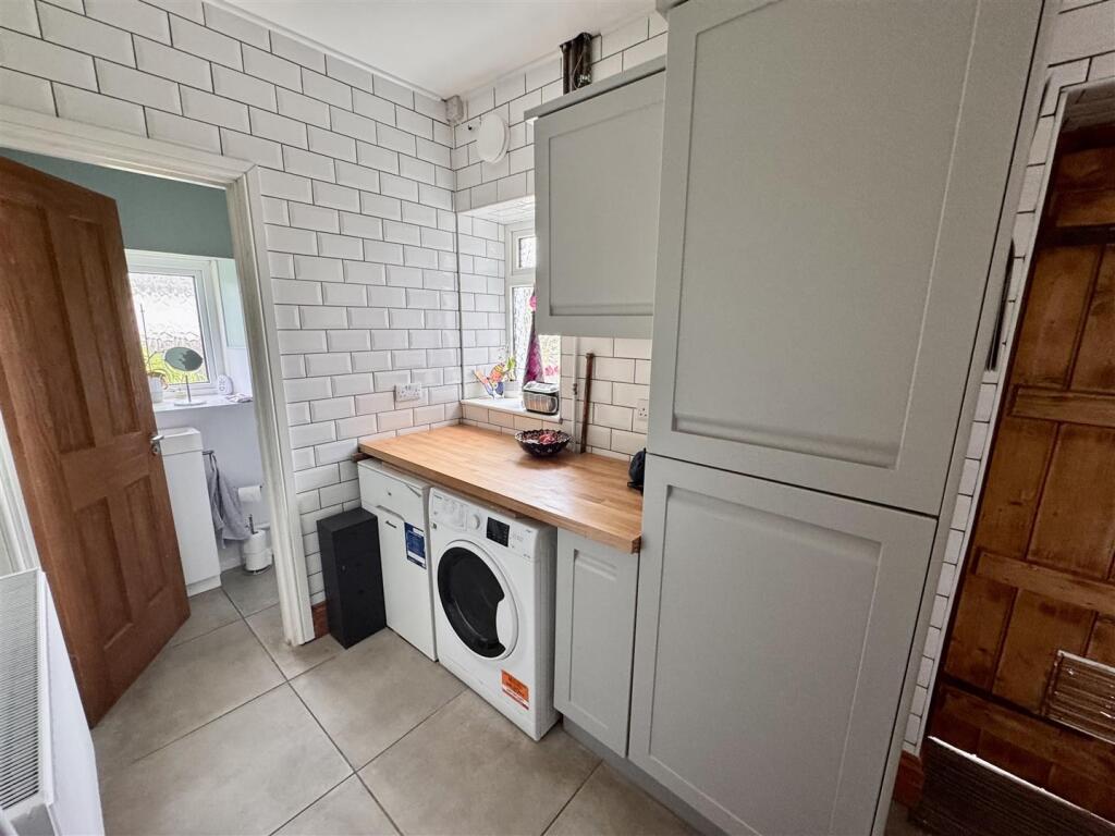 Kitchen with utility area
