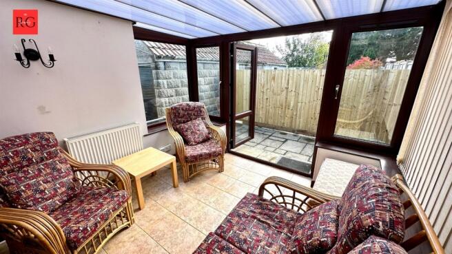 A bright and inviting living room with large gl...