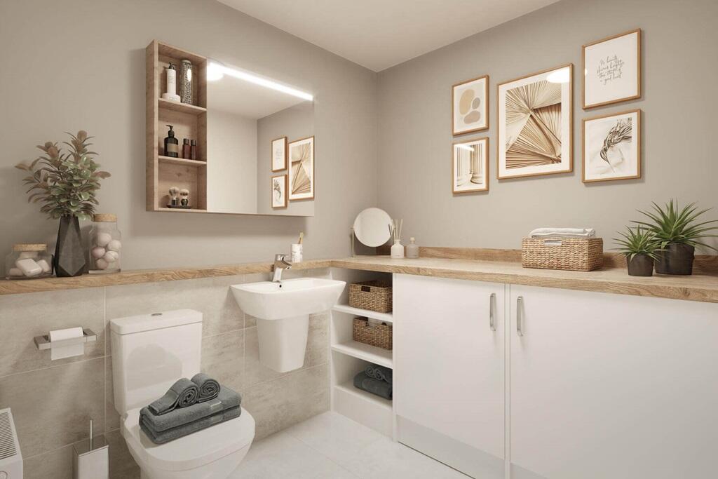 A guest cloakroom also hosts space for laundry appliances