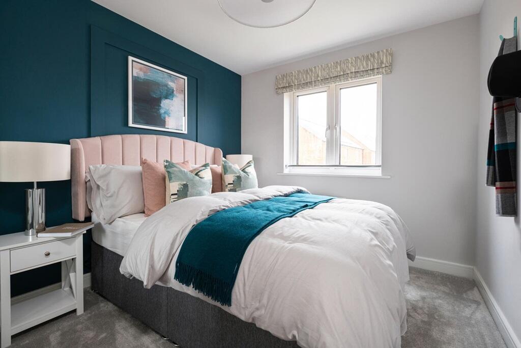 The second double bedroom overlooks the rear garden