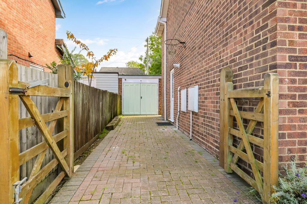 Side Driveway Leading To Garage