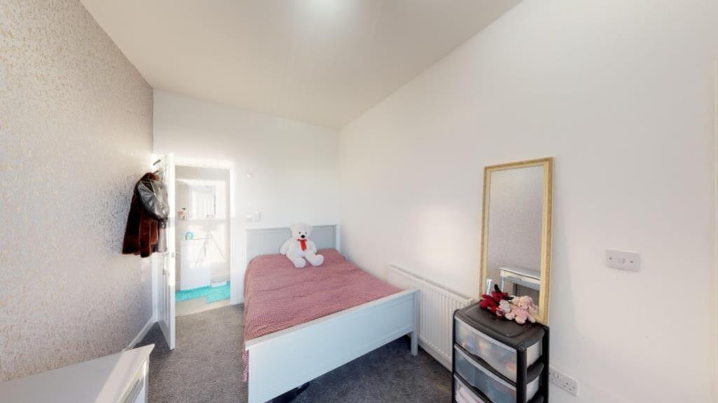 A bright and inviting double bedroom, perfect f...