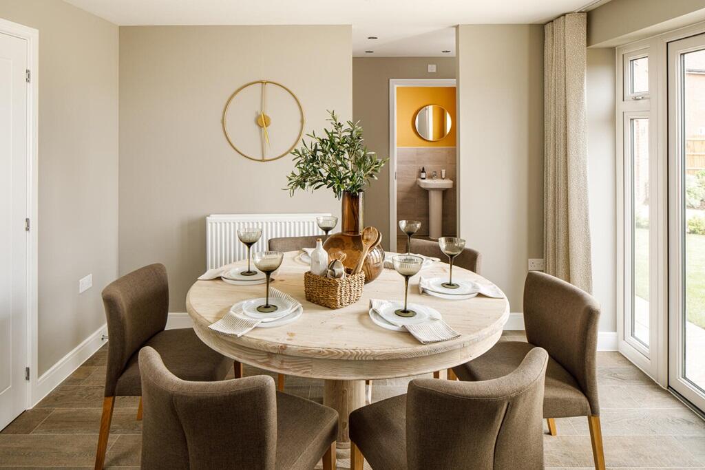 The dining areas leads on to the utility room and cloakroom