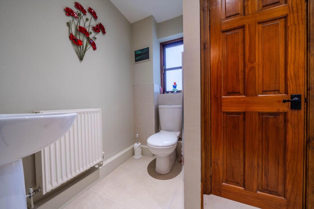 DOWNSTAIRS TOILET/UTILITY ROOM