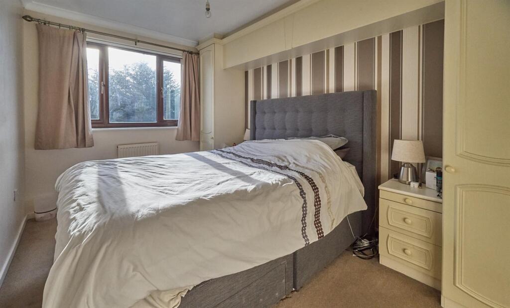 BEDROOM ONE TO REAR