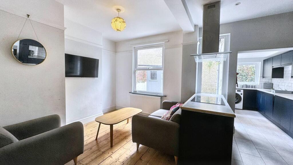 A modern living room featuring comfortable seat...
