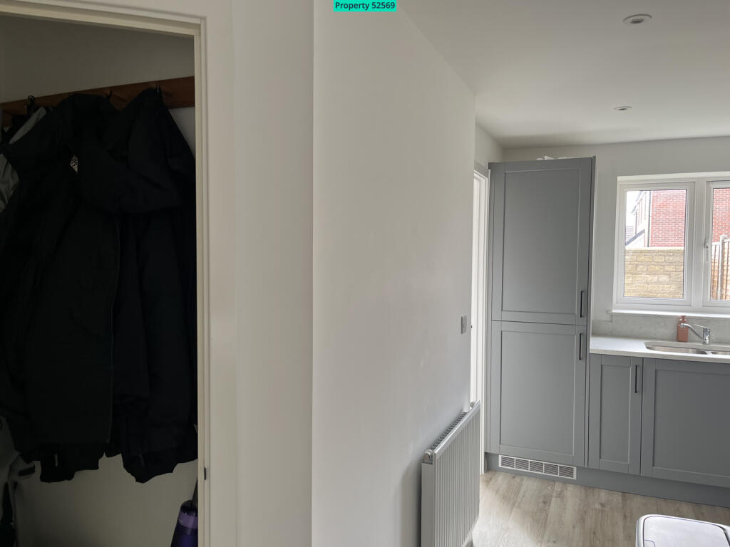Separate downstairs cloakroom / storage cupboard 