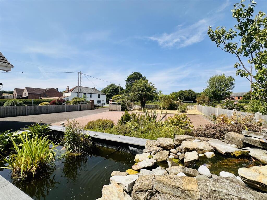 To The Front Of The Property