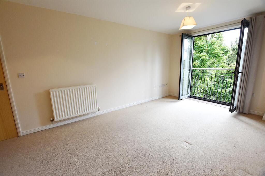 17 Medina House - Living to French Doors NEW.JPG