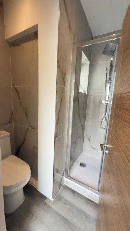 A modern and well-maintained bathroom featuring...