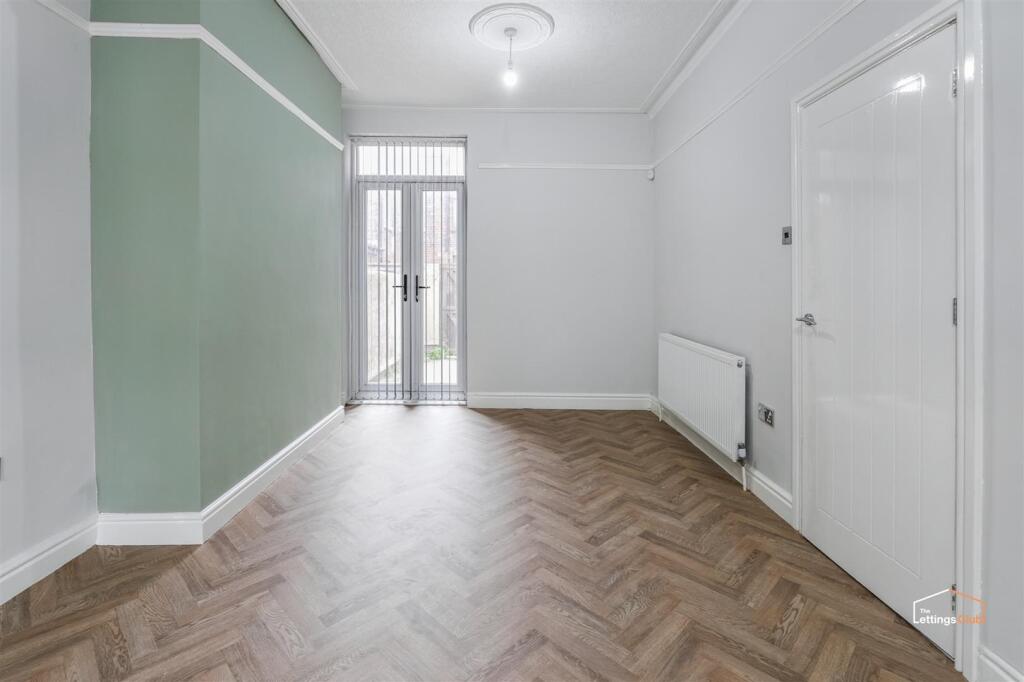 Patio doors leading to courtyard